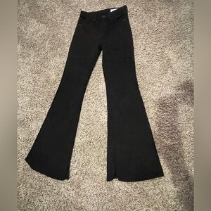 Black flare jeans, split hem